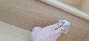 Wiping off adhesive