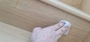 Quick repairs of squeaking stairs. 7 Wiping off adhesive