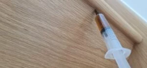 Quick repairs of squeaking stairs. 6 injecting adhesive